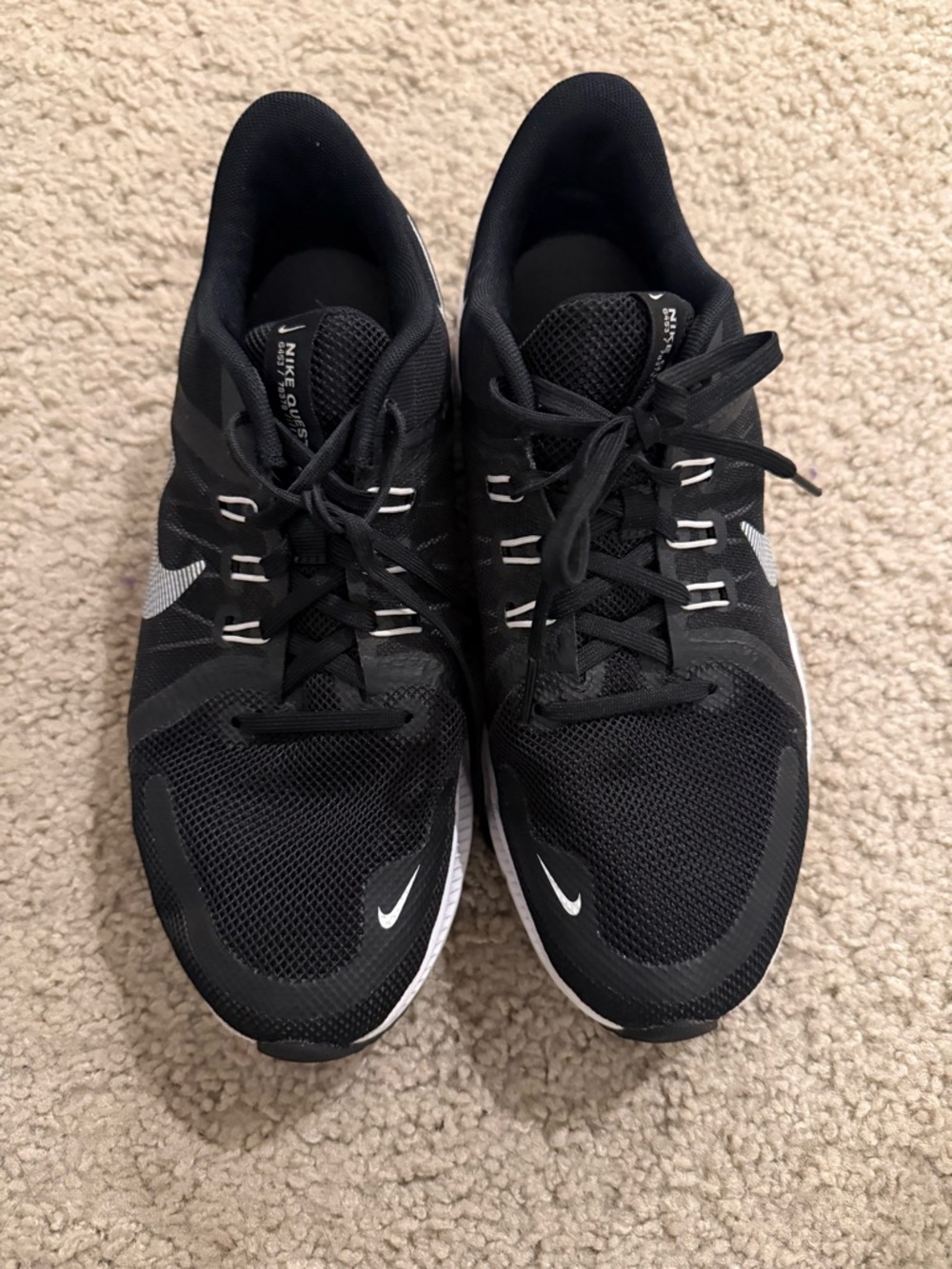 Nike Black Running Sneakers with White Swoosh